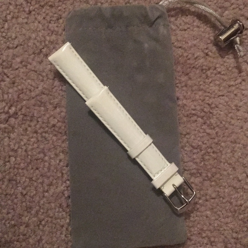 White Patent Leather Michele band.  Never worn.